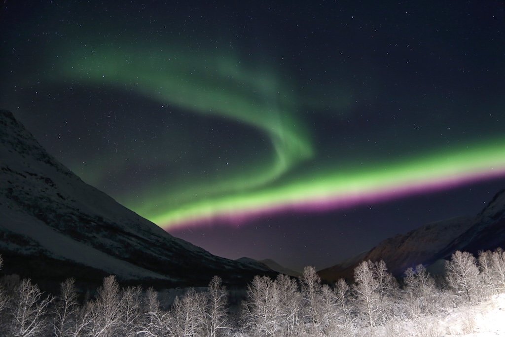 Green and magenta aurora over Lapland, Norway