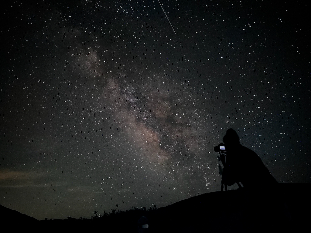 Man taking photos of the Milky Way